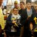Fans wait in a line wrapped around the the second floor of the M Den in order to meet Michigan football star Desmond Howard during an autograph signing at the M Den on Friday.  Melanie Maxwell I AnnArbor.com